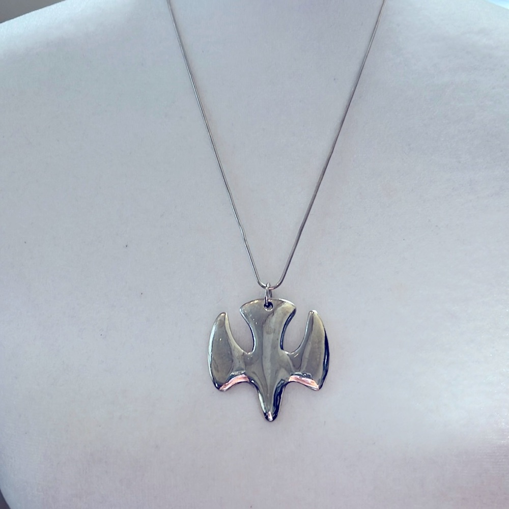Retired James Avery Sterling descending dove pendant with complimentary chain